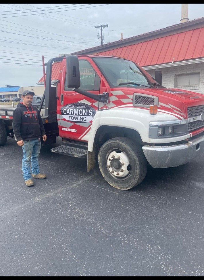 Carmon's Towing truck and driver